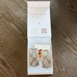 Stylish Sparkl Apple Watch band made from upcycled Gucci bag.